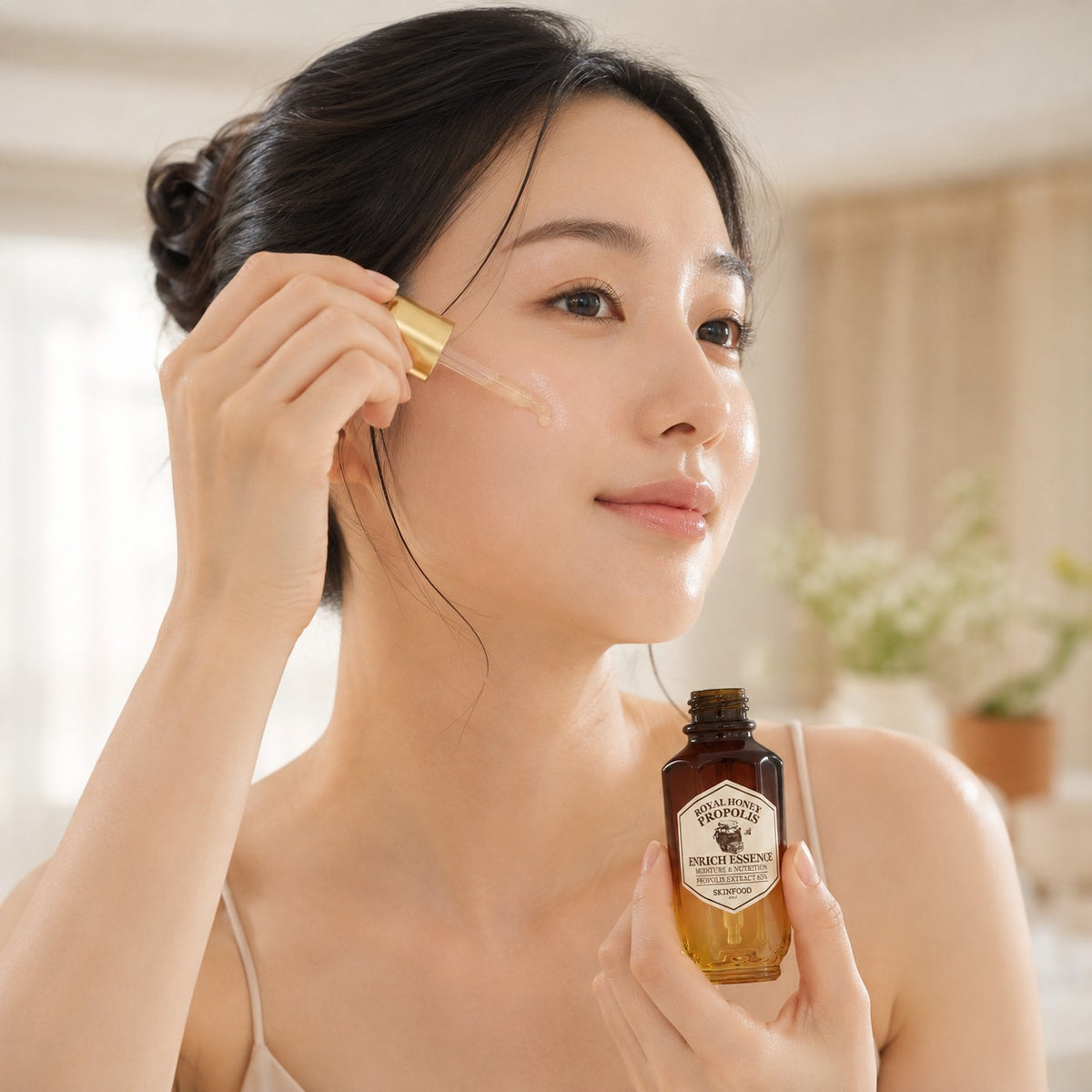 SKINFOOD — Esencia enriquecida con miel y propóleo · 50 ml