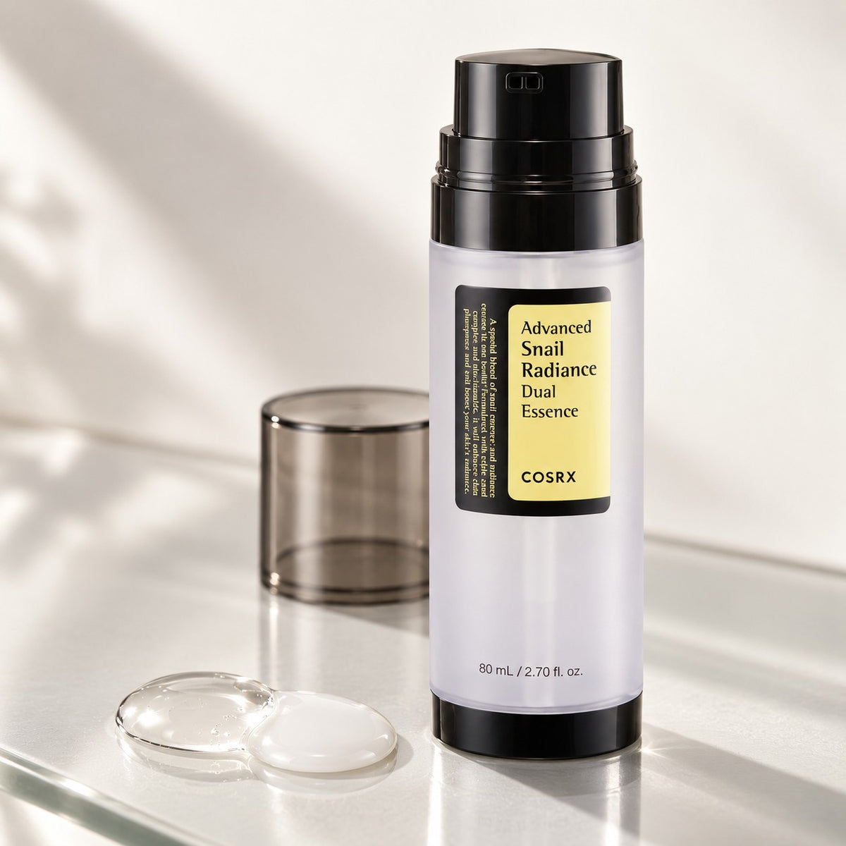 COSRX — Esencia dual iluminadora con mucina de caracol · 80 ml