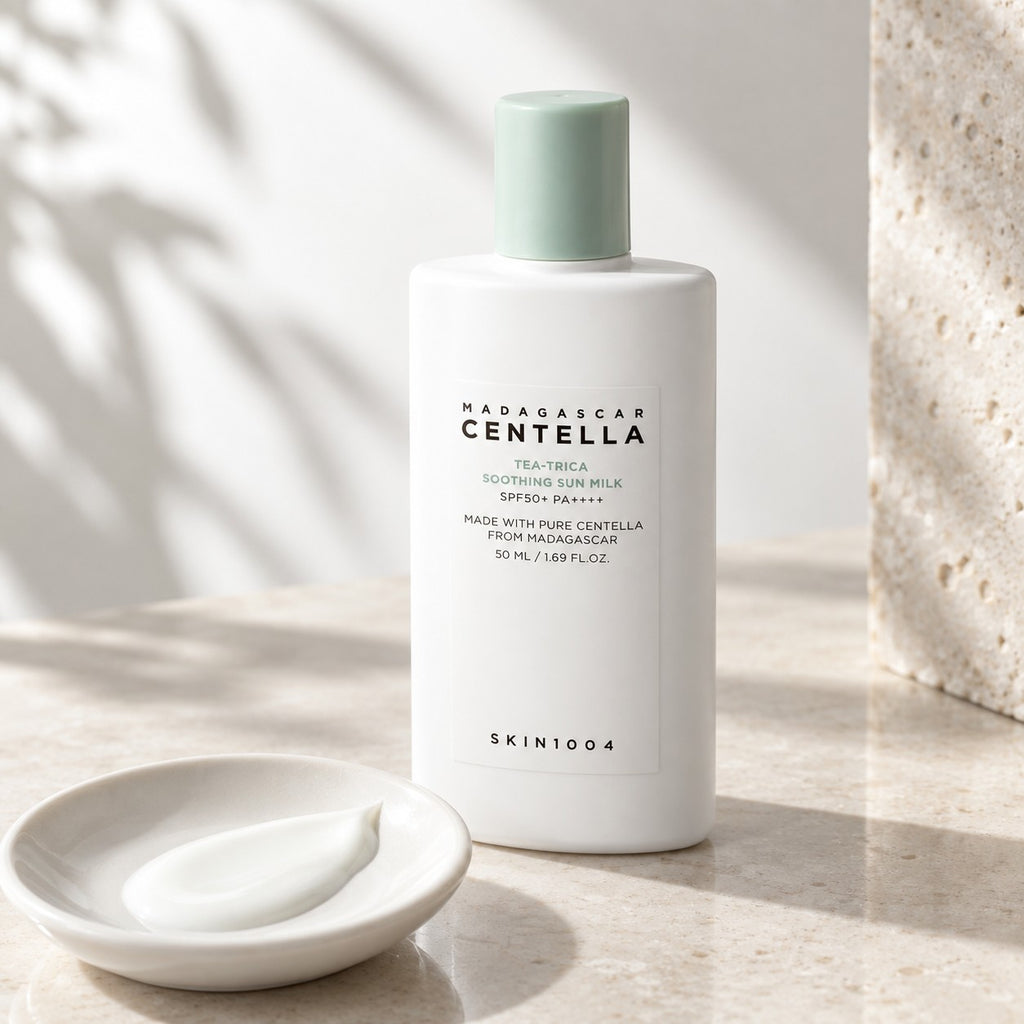 SKIN1004 — Leche solar calmante Tea-Trica con centella de Madagascar SPF50+ PA++++ · 50 ml